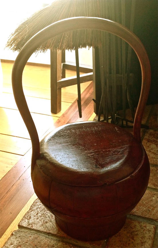 Traditional wooden Chinese lunch box. A far grander bronze cauldron is anciently symbolic of civilisation -- cultural and spiritual nourishment - photograph by postgutenberg@gmail.com