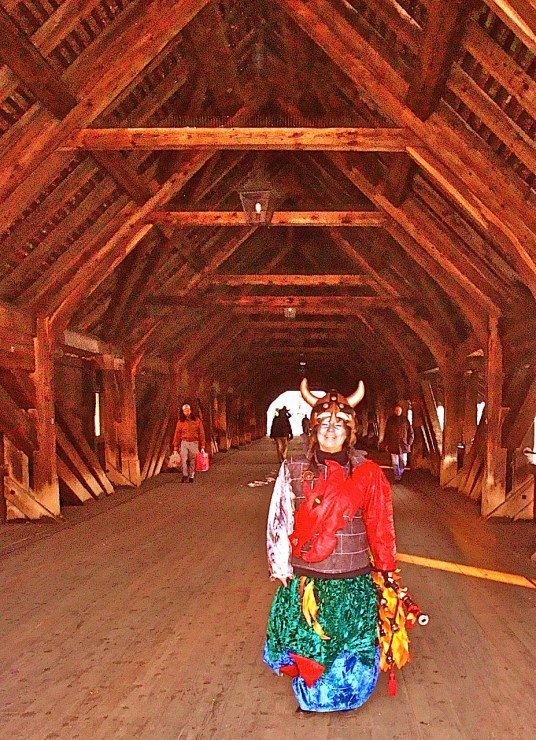 On Olten’s covered bridge, the Holzbrücke, a costumed girl-Viking recalled by a brilliant encapsulation of old-fashioned publishing by Holly Ward (see below) - HAPPY NEW YEAR from postgutenberg@gmail.com 
